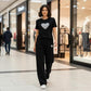 Women’s Heart Print 2 - Piece Set – Short Sleeve T-Shirt & Wide Leg Pants, Soft Summer Loungewear Co - Ord, Tracksuit Travel & Home Wear Outfit - LUXE DIVAWomen’s Heart Print 2 - Piece Set – Short Sleeve T-Shirt & Wide Leg Pants, Soft Summer Loungewear Co - Ord, Tracksuit Travel & Home Wear OutfitLUXE DIVALUXE DIVA2PCHeartSSTroSetBlk6-12Women’s Heart Print 2 - Piece Set – Short Sleeve T-Shirt & Wide Leg Pants, Soft Summer Loungewear Co - Ord, Tracksuit Travel & Home Wear Outfit6 - 12Black